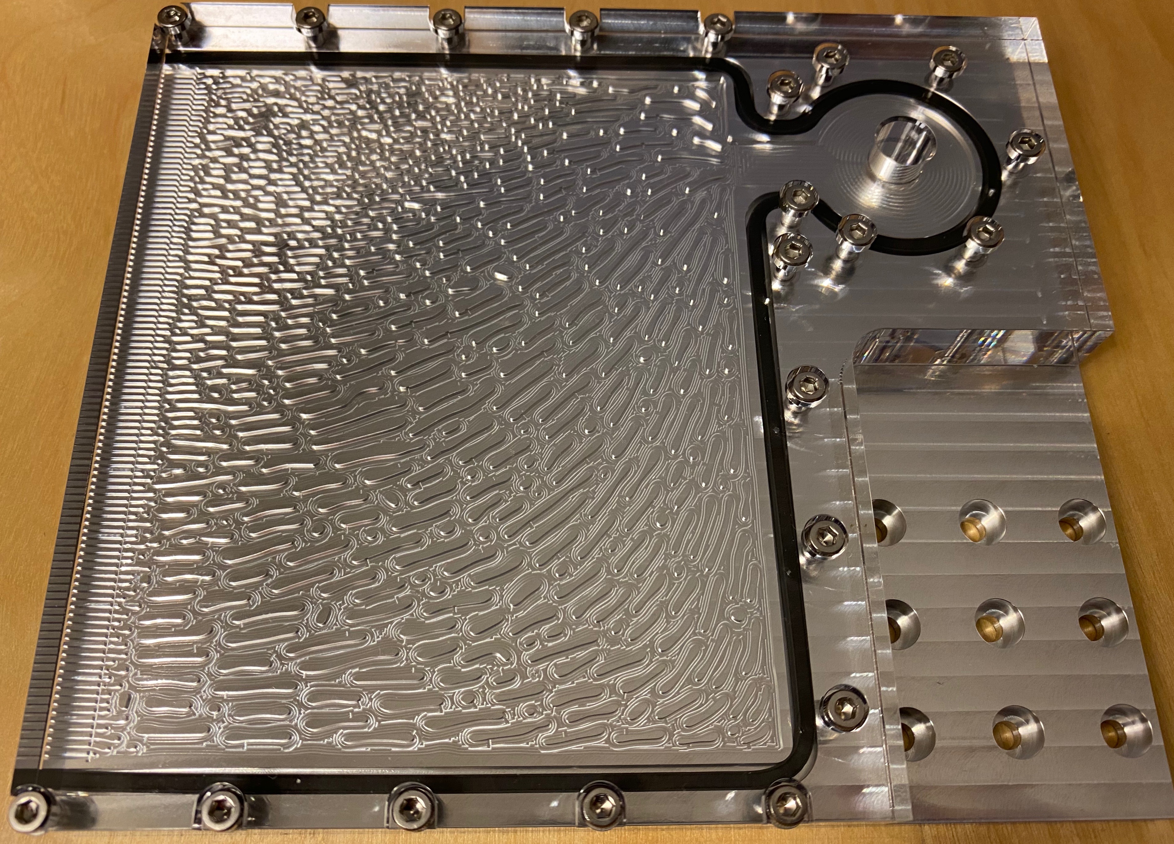 A photo of one of the TRINA team's metal flow field plate prototypes.